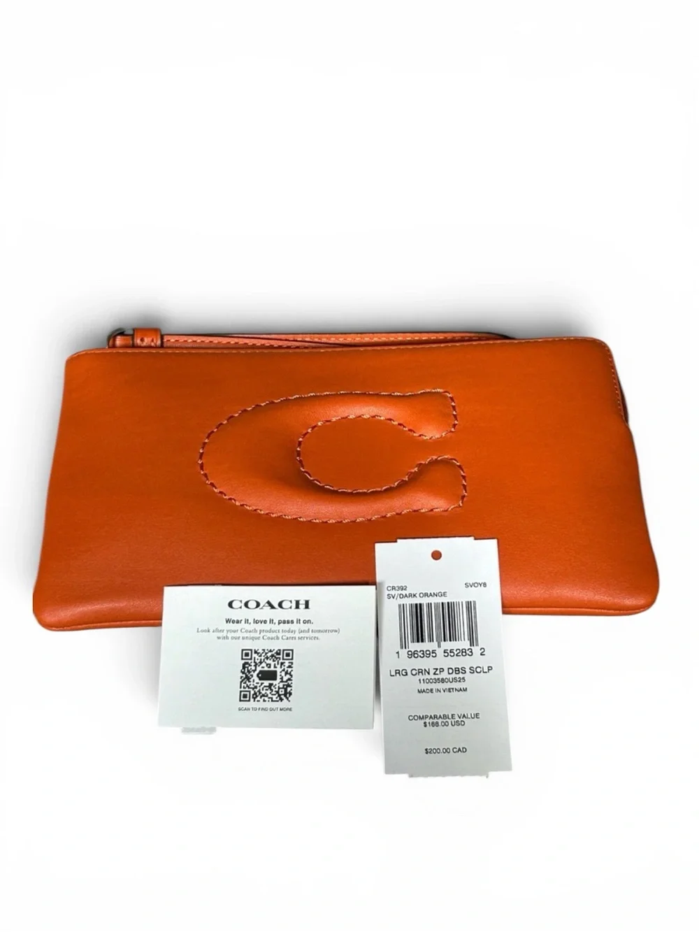 COACH Debossed Sculpted C Smooth Leather Large Corner Zip Wristlet inDark Orange